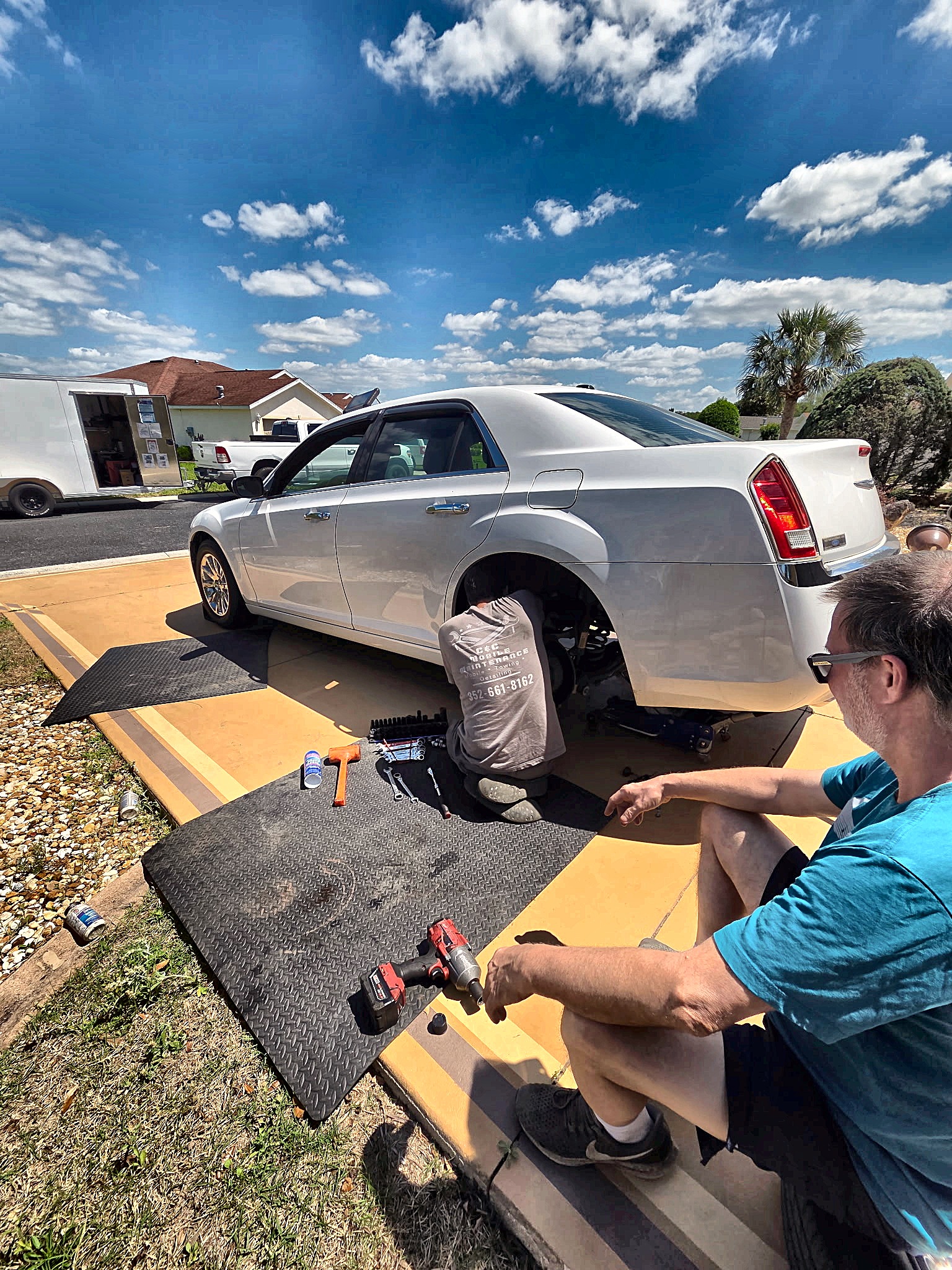 C&C working in a customer's driveway